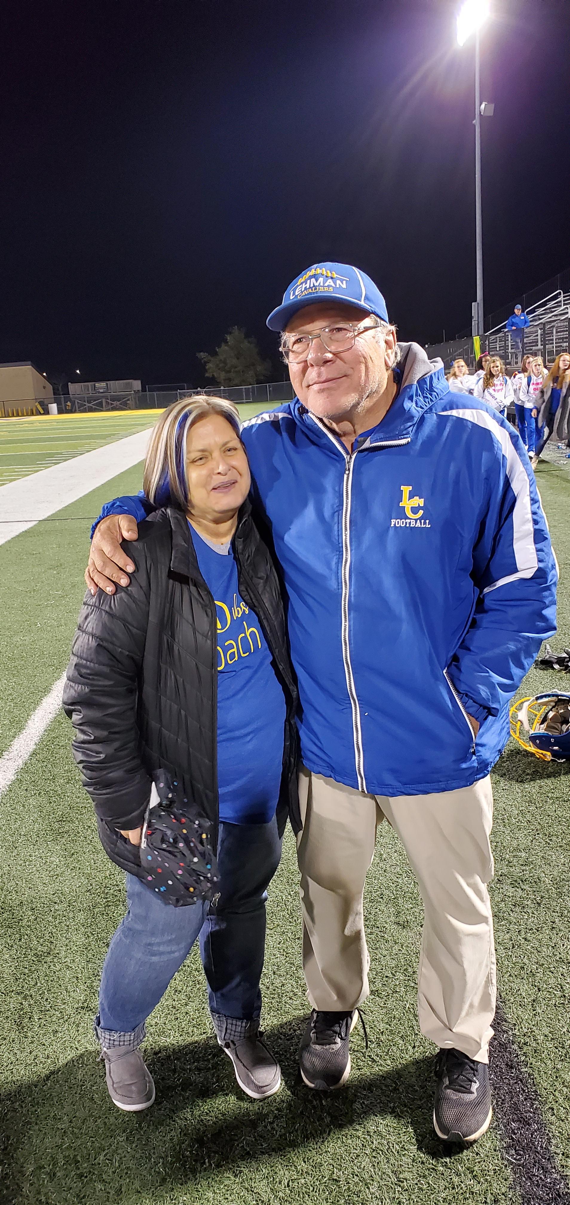 Coach Roll and his wife. 